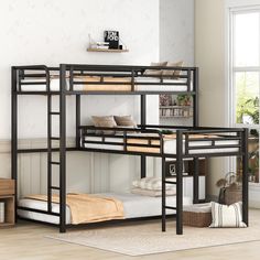 a bunk bed with two sets of beds underneath it in a white and beige room