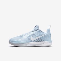 the nike zoom basketball shoe is light blue and has white accents on the upper part