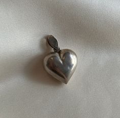 Cute silver puffy heart pillow pendant. Pre-loved item Stamped 825  Size (approx.): 3cm long with bail, 2cm wide, about 1cm thick Weight: 4.016g **FREE shipping within Canada and USA** If you have any questions or concerns, please do not hesitate to contact us. We will be more than happy to help you and answer any inquiries.  We invite you to check out our shop for more fabulous items! Silver Heart Jewelry, Heart Jewellery, Pendant Heart, Heart Pillow, Silver Heart Pendant, Puffy Heart, Sterling Silver Necklace, Necklace Silver, Silver Heart