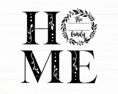 the word home is written in black and white with a wreath on top of it