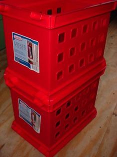 three red plastic containers stacked on top of each other