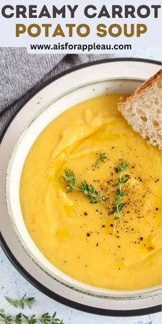 creamy carrot potato soup in a white bowl with a slice of bread on the side