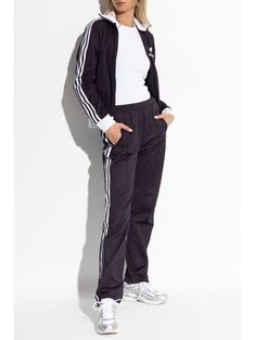 Find ADIDAS Logo-print Track Pants on Editorialist. dark purple cotton blend jersey texture logo print to the side elasticated waistband side stripe detailing seam detailing to the rear Adidas Gym Pants With Three Stripes, Sportswear Joggers With Side Stripes, Jogging Joggers With Side Stripes, Adidas Cotton Gym Pants, Adidas Casual Joggers With Side Stripes, Athleisure Sweatpants With Three Stripes For Gym, Jogging Sweatpants With Side Stripes, Stretch Sweatpants With Side Stripes For Jogging, Adidas Sports Pants With Side Stripes