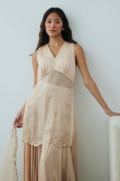 Sand organza and satin short tunic with sequins, beads and lace hand embroidery. Comes with sharara and a dupatta. - Aza Fashions Ethereal Outfit, Satin Kurta, V Neck Kurta, Daytime Wedding, Kurta Sharara Set, Kurta Sharara, Short Tunic, Scalloped Border, Satin Short