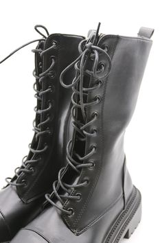 Eda Combat Boots This product has been hand-picked by Storets' stylists. Spring Workwear Combat Boots With Lug Sole, Spring High Ankle Combat Boots With Edgy Style, Edgy Round Toe Lace-up Boots For Workwear, Edgy Round Toe Lace-up Boots For Work, Edgy Lace-up Boots With Round Toe For Work, Edgy Lace-up Round Toe Work Boots, Edgy High Ankle Combat Boots For Spring, High Ankle Combat Boots For Spring Workwear, Spring Workwear High Ankle Combat Boots