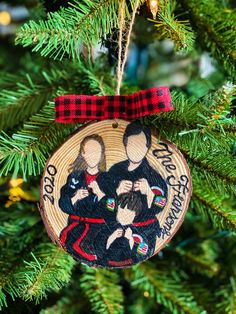 an ornament hanging from a christmas tree