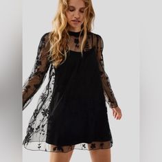 Free People Cecelia Sheer Mini Dress Black Size Xs. New Without Tag Add Effortless Edge To Any Look With This Sweet Yet Sultry Mini Dress Featured In A Long Sleeve, Shapeless Silhouette And Sheer, Floral Embroidered Fabrication With Slip Lining For Added Dimension Fit: Shapeless, Relaxed Fit High Neckline Pleating On Shouders Embroidery Throughout Pull-On Design New Without Tag. May Have Been Tried On In Store, But In Like New Condition. Line Thru Tag Is To Prevent Store Return Images Are Also Part Of The Description Spring Mini Dress With Sheer Sleeves, Sheer Sleeves Mini Dress For Summer, Sheer Sleeve Mesh Dress For Spring, Spring Long Sleeve Mesh Dress For Night Out, Black Long Sleeve Mesh Dress For Summer, Summer Mini Dress With Sheer Sleeves, Sheer Mini Mesh Dress For Fall, Fall Sheer Mesh Mini Dress, Black Mini Mesh Dress For Spring