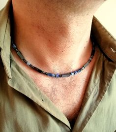 Mens beaded necklace made of natural sodalite and black hematite stone beads with lobster clasp closure.  Natural stones beaded necklace, a nice gift for him. All metal components are stainless steel. Necklace length: 18 inches (45 cm) Sodalite beads: 4 mm Hematite beads: 13x4 mm, 6x4 mm For all products are used only genuine high-quality Italian leather, natural stones and wood. All metal materials are lead and nickel free.  /Gift wrapping and packaging/ :   All items ordered will be placed in a gift bag and shipped in a bubble mailer. /Jewelry care instructions/: Not recommended bathing, physical activity, swimming, sleeping while wearing jewelry. It may damage all the components of the product. Beaded Necklace For Men, Beaded Necklace Black, Black Beaded Necklace, Mens Beaded Necklaces, Sodalite Necklace, Jade Bead Necklace, Raw Stone Necklace, Monogram Bracelet, Leather Cord Bracelets