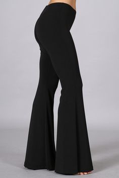 Chatoyant Basic Bell Bottoms Black Solid basic bell bottom flare pants with elastic waist in a comfortable and stretchy fit. Smooth, cool, wrinkle-free, non-pilling, and machine-washable fabric. Perfect for casual wear and everyday wear, a must have staple for your wardrobe! Stay Sexy! Fabric: Polyester/Spandex 95/5 Pr Black Pants Bell Bottoms, Black Leggings Bell Bottoms, Ball Bottom Pants, Legging Bell Bottoms, Black Bell Bottom Leggings, Bell Bottom Leggings Outfits, Black Bell Bottoms Outfit, Bellbottom Pants Outfits, Bellbottom Leggings