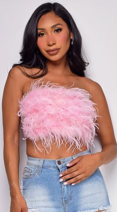 Feather tube top Back zipper closure 95% Polyester 5% Spandex (Stretchy) Model's height: 5'8" Model is wearing size S Strapless Tube Top With Zipper Closure For Night Out, Fitted Sleeveless Feathered Tops, Fitted Sleeveless Feather Tops, Pink Bandeau Tube Top For Club, Pink Feather Top, Feather Tube Top, Top With Feathers, Nicki Minaj Tour, Pink Tube Top