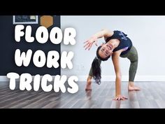 a woman doing a handstand in front of a wall with the words floor work tricks