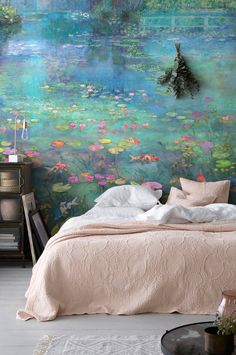 a bedroom with a large painting on the wall behind it and a bed in front of it