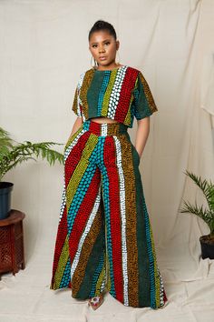 This exquisite outfit is an ideal choice for any occasion, be it a date, hangouts, work, church, dinner, movie night, birthday, wedding or any party. Its versatility ensures it's the perfect fit for every occasion. Features: - Crafted by hand from 100% African wax cotton As always, our designs are completely handmade and can be customized to your liking, this means you're welcome to request alterations, whether it's custom lengths for petite or tall individuals, design element additions or removals, or a different fabric selection. Just get in touch with us and we will be happy to take any special request. For the best fit, you can provide your measurements or select your size from our accurate size chart. Don't forget to include your height when ordering to ensure the perfect length. Care Casual Multicolor Party Sets, Casual Multicolor Printed Pant Set, Cotton Two-piece Set With Short Sleeve, Multicolor Short Sleeve Matching Pant Set, Casual Multicolor Two-piece Sets, Multicolor Matching Short Sleeve Pant Set, Multicolor Matching Pant Set, Multicolor Matching Set For Party, Multicolor Matching Party Set