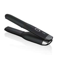 Ghd cordless hair straightener in sleek black design, perfect for on-the-go styling and touch-ups anytime, anywhere. Ghd Unplugged, Cordless Hair Straightener, Burnt Hair, Best Hair Straightener, Hair Straighteners Flat Irons, Hair Straightening Iron, Thick Curly Hair, Ceramic Heater, Hair Straighteners