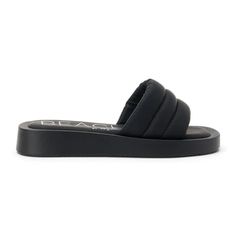 Puffy one-band slide sandal made from vegan leather. Synthetic leather upper Manmade outsole 1.25 in / 3.18 cm heel height 0.75 in / 1.91 cm platform Synthetic leather lining Padded insole Slip-on style Whole sizes only; for 1/2 sizes, order next size up. Synthetic Slide Sandals With Textured Sole, Platform Slide Slippers In Synthetic Material, Slide Sandals, Kids Accessories, Vegan Leather, Heel Height, Leather Upper, Slip On, Sandals