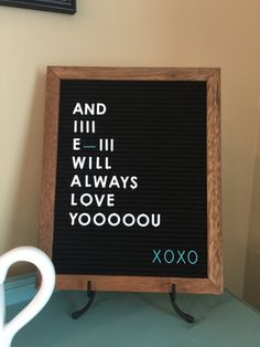 a sign that says and i will always love you xoxo next to a cup