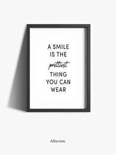 a black and white poster with the words, a smile is the prettiest thing you