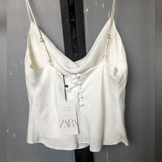 New W/ Tags Luxury Ivory Camisole. For Dressing Up. Size Sm See Measurements In Pics. White Buttoned Tank Top, Chic Buttoned Tank Top For Day Out, Elegant Zara Cami Tank Top, Elegant White Tank Top With Buttons, Elegant Spring Tank Top With Buttons, Chic White Buttoned Tank Top, White Tank Top With Buttons, Elegant Summer Tank Top With Buttons, Chic Cami Tank Top With Button Closure