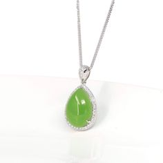 * INTRODUCTION----- This pendant is made with very high-quality genuine nephrite luxury apple green jade. It looks so luxurious and exquisite. The green jade looks so clean and smooth. And the color is lovely apple green. The style is simple and classic. It's a perfect gift for you and your love. * Specifications: Approx. total weight: 5.52 g Pendant Dimension: Large 27.77 mm*12.88 mm * 8.35 mm Primary stone: Genuine apple green nephrite jade Primary stone dimension: L 16.7 mm * 12.2 mm Material Bezel Set Necklace, Tear Drop Pendant, Vs1 Diamond, Key Pendant Necklace, Gifts For Your Sister, Gold Chain With Pendant, Buddha Pendant, Drop Pendant Necklace, Nephrite Jade