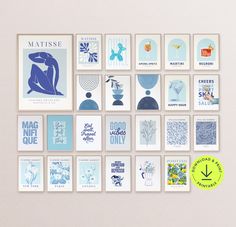 a collection of blue and white posters on a wall