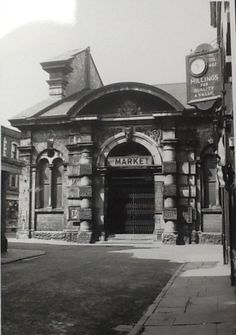 black and white photograph of an old market building