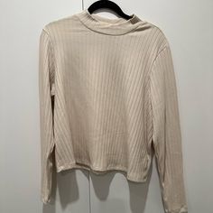 Neutral Tan Long Sleeve Mock Neck Top From Old Navy! Cropped Length With Ribbed Detailing. Great For Layering! Ribbed Neutral Top For Fall, Basic Cream Tops For Fall, Basic Cream Fall Tops, Cream Turtleneck Tops For Spring, Beige Ribbed Tops For Fall, Cream Turtleneck Spring Tops, Ribbed Beige Tops For Fall, Beige Turtleneck Top For Spring, Fall Beige Ribbed Tops