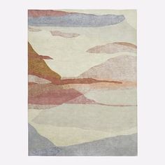 a rug with an abstract design on the front and back of it, featuring mountains in pastel colors