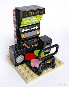 an electronic device made out of legos on top of a white surface with the words ultra sonic above it