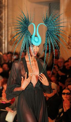 Naomi Campbell wearing Philip Treacy Phillip Treacy Hats, Philip Tracy, Phillip Treacy, Fascinators Hats, Turquoise Hat, Pola Rok, Philip Treacy Hats, Crazy Hat, Hats And Fascinators