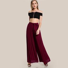 These wide leg pants are simply lovely. Featuring a sash tie belt with a pleated front and a flowing form. These pants pair perfectly with a bodysuit and heels. Add statement jewelry and you are ready to rock this fabulous look. Made with a polyester blend for comfort and style. Pleated Palazzo Pants, Womens Palazzo Pants, Burgundy Pants, Mid Waist Pants, Pants Skirts, Wideleg Pants, Fashion Hoodies, Fashion Stores, Women Pants