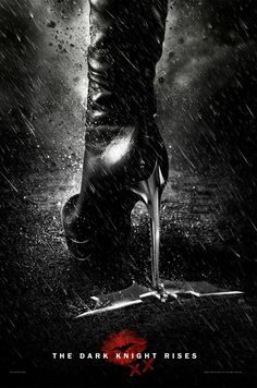 the dark knight rises movie poster with batman's feet and boots in the rain