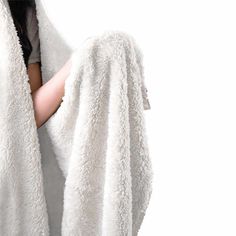 a woman wrapped up in a white towel