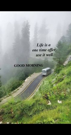 a car driving down a road with fog in the background and a quote about life is a one time offer use if well good morning