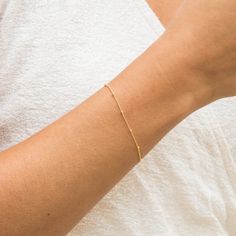 Our Dainty Satellite Chain Bracelet is the perfect everyday bracelet. It's lightweight and dainty, so you won't even notice it's on. It makes a perfect piece as a gift for your friends, & even yourself! DETAILS 14k gold filled -or- sterling silver chain, clasp, and findings Bracelet length: 6.5” with 1” extender Safe for sensitive skin & shower safe Matching jewelry: Dainty Satellite Chain Necklace, Dainty Satellite Chain Anklet Everyday Bracelet, Bracelet Simple, Jewelry Dainty, Fitness Bracelet, Mom Jewelry, Gold Filled Ring, Matching Jewelry, Dainty Bracelets, Gold Bracelet Chain