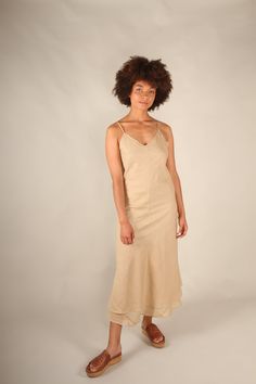 This elegant simple slip dress is made from double layered fine cotton voile. Bias cut with a central seam it is a flattering feminine shape. With spaghetti straps and a corseted back it can be adjusted to different bust sizes , and hugs the body shape. Available in 4 different colours Beige Olive Green Teal Blue Maroon and 5 sizes from Xs to XL For more natural clothing please see my shop www.etsy.com/shop/elfnfelt Sheer V-neck Slip Dress For Summer, Sleeveless Beige Slip Dress Bias Cut, Sleeveless Bias Cut Beige Slip Dress, Sleeveless Bias-cut Beige Slip Dress, Sheer Midi-length Summer Slip Dress, Sheer Midi-length Slip Dress For Summer, Sheer Midi Slip Dress For Summer, Sheer Midi Length Summer Slip Dress, Sheer Midi Length Slip Dress For Summer