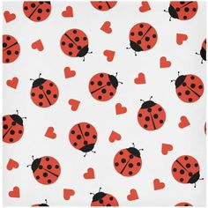 a ladybug pattern with hearts on it