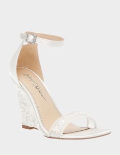 a women's white high heeled sandal