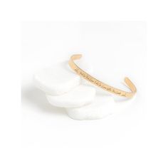 a gold cuff bracelet that says, i love you to the moon and back