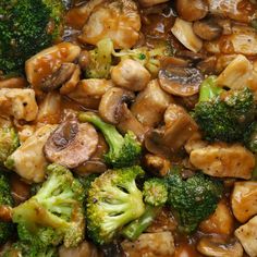 broccoli and mushrooms are mixed together in a stir - fry dish with brown sauce