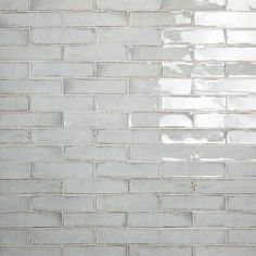 a white brick wall with no mortars on it