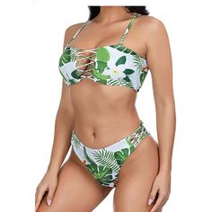 Sexy 2 Piece Bikini Swimsuit Is In A Beautiful Light Green Tropical Print. The Top Is Padded With Detachable Straps That Creates A Bandeau Style. The Bikini Bottom Has A High Leg With Strappy Features On The Side. Perfect For That Tropical Vacation On The Beach Or Lounging By A Pool. Offers Welcomed And Bundles Encouraged Tropical Strappy Swimwear For Sunbathing, Tropical Strappy Fitted Swimwear, Tropical Fitted Strappy Swimwear, Fitted Tropical Strappy Swimwear, Fitted Tropical Swimwear With Tie-side Bottom, Fitted Tropical Swimwear With Bra-friendly Design, Spring Tropical Print Swimwear With Tie-side Bottom, Tropical V-neck Swimwear With Floral Print, Tropical Swimwear With Built-in Bra And Underwire