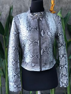 Women's Snakeskin Jacket PREMIUM QUALITY LUXURY STYLE Outside: GENUINE PYTHON LEATHER Accessories: golden color (please see the photo). All our products are 100% handmade, we always try to create interesting ideas to make your style unique. We use only the highest quality materials and accessories from around the world and only best leather from Indonesia. Before listing each new model undergoes different quality and usability tests at every stage of production. Every single piece is made by han Snakeskin Jacket, Leather Blazer Women, Timeless Bags, Elegant Jacket, Stylish Backpacks, Interesting Ideas, Luxury Style, Zipper Jacket, Leather Blazer