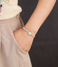 Not only does the Handmade Natural Amazonite Stone Braided String Bracelet - Adjustable look great, it makes the perfect gift for someone. Amazonite can help cleanse the electromagnetic energy around from computers, tables and phones. It will help you clear your mind and can bring a lot of joy and happiness. It's a stone of Truth and Courage. Amazonite can help release toxic emotions and is known as a good lucky "hope stone". It benefits the Heart Chakra which is the center for love, compassion Flow Like Water, Bracelets String, Stone Nail Art, Steampunk Bracelet, Wrap Armband, Amazon River, New Bracelet, Sacred Stones, Amazonite Stone