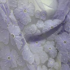 Beaded 3D Floral Lace Fabric Embroidered on 100% Polyester Net Mesh | Lace USA - GD-216 Elegant Embroidered Fabric With Floral Applique For Party, Elegant Floral Embellished Lace Fabric, Elegant Organza Fabric With 3d Embroidery, Party Organza Fabric With Floral Embroidery, Elegant Purple Tulle Fabric For Spring, Purple Embroidered Organza Fabric For Party, Purple Organza Embroidered Fabric For Wedding, Purple Embroidered Organza Fabric For Wedding, Elegant Embroidered Fabric With Appliques For Party