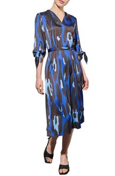 This crêpe de Chine shirtdress is patterned in an abstract print that's inspired by bold animal spots for an elegant look that stands out. 45" length (size Extra Small) Slips on over head V-neck Three-quarter sleeves Removable tie belt Unlined 100% polyester Hand wash, dry flat Imported Abstract Animals, Shirtdress, Blue Dark, Tie Belt, Three Quarter Sleeves, Abstract Print, Three Quarter, Hand Wash, Slip On