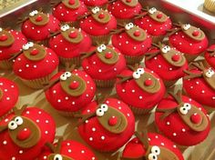 red cupcakes are arranged in the shape of animals