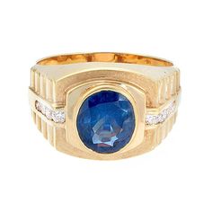 A gentleman’s ring featuring an approximately 4.00 carat oval cut blue sapphire in a bezel setting. The sapphire is an ocean blue color. Along the uniquely chiseled 18K yellow gold shank are approximately 0.20 carats of round diamonds. Currently ring size 9.75 Ocean Blue Color, Contemporary Wedding Rings, Brown Diamond Ring, Moonstone Engagement Ring Set, Blue Sapphire Diamond Ring, Diamond Gold Ring, Vintage Engagement Rings Unique, Moonstone Engagement, Moonstone Engagement Ring