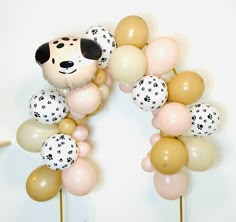 a bunch of balloons that are shaped like a dog