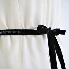 Add a gorgeous touch of sparkle to your wedding dress or bridesmaid dress with my handmade velvet sash belt. This luxurious bridal sash features hand-stitched beads on sumptuous velvet and is perfect for weddings with a black, monochrome or geometric theme. I love the glass bugle beads used in this design and the subtle Art Deco feel. It works beautifully for brides and bridesmaids and is a lovely way to accentuate the waistline of your dress. The shiny, opaque black beads look gorgeous against Velvet Sash Belt, Fitted Ribbon Sashes For Evening, Elegant Black Sash For Evening, Elegant Evening Bridal Belt With Embroidery, Elegant Embroidered Bridal Belt For Evening, Velvet Ribbon Wedding, Velvet Sash, Blue Tassel Earrings, Black Monochrome