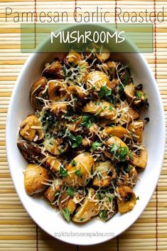 a white bowl filled with mushrooms covered in parmesan cheese